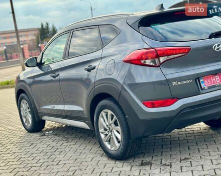 Сірий Хендай Туксон, об'ємом двигуна 2 л та пробігом 184 тис. км за 13950 $, фото 19 на Automoto.ua