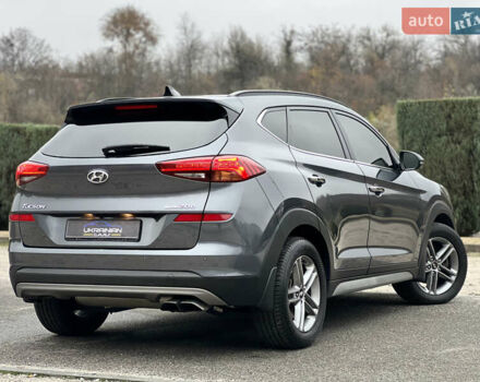 Серый Хендай Туксон, объемом двигателя 2 л и пробегом 117 тыс. км за 20600 $, фото 9 на Automoto.ua