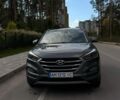 Серый Хендай Туксон, объемом двигателя 1.59 л и пробегом 144 тыс. км за 15800 $, фото 1 на Automoto.ua