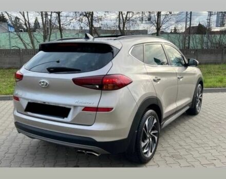 Серый Хендай Туксон, объемом двигателя 1.6 л и пробегом 93 тыс. км за 9000 $, фото 4 на Automoto.ua