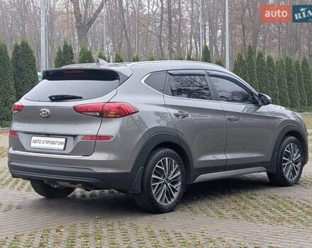 Серый Хендай Туксон, объемом двигателя 2 л и пробегом 204 тыс. км за 17500 $, фото 10 на Automoto.ua