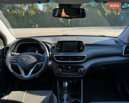 Серый Хендай Туксон, объемом двигателя 2 л и пробегом 34 тыс. км за 26000 $, фото 11 на Automoto.ua