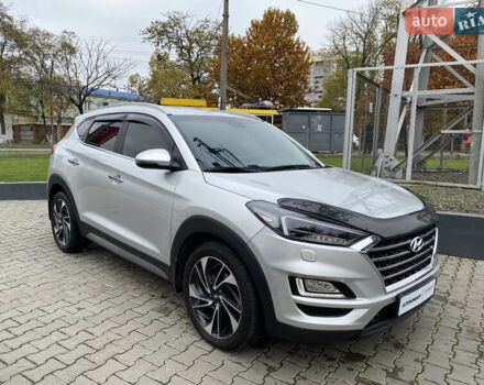 Серый Хендай Туксон, объемом двигателя 2 л и пробегом 73 тыс. км за 22400 $, фото 6 на Automoto.ua