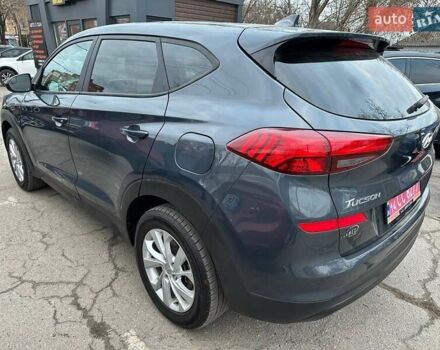 Сірий Хендай Туксон, об'ємом двигуна 2 л та пробігом 120 тис. км за 15999 $, фото 3 на Automoto.ua