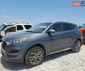 Серый Хендай Туксон, объемом двигателя 2.4 л и пробегом 104 тыс. км за 3600 $, фото 1 на Automoto.ua