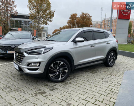 Серый Хендай Туксон, объемом двигателя 2 л и пробегом 73 тыс. км за 22400 $, фото 4 на Automoto.ua