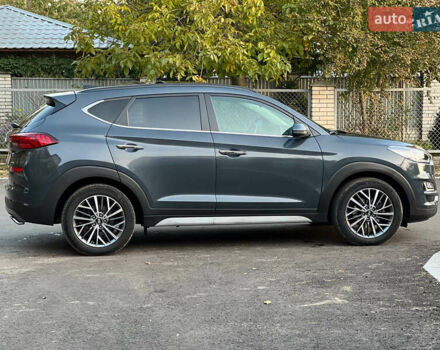 Серый Хендай Туксон, объемом двигателя 2.36 л и пробегом 85 тыс. км за 22500 $, фото 3 на Automoto.ua
