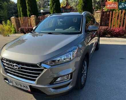 Серый Хендай Туксон, объемом двигателя 2 л и пробегом 34 тыс. км за 26000 $, фото 2 на Automoto.ua