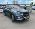 Серый Хендай Туксон, объемом двигателя 2 л и пробегом 142 тыс. км за 23290 $, фото 1 на Automoto.ua