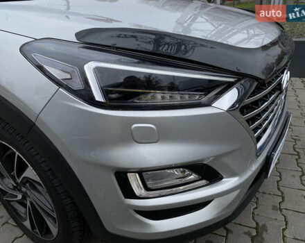 Серый Хендай Туксон, объемом двигателя 2 л и пробегом 73 тыс. км за 22400 $, фото 7 на Automoto.ua