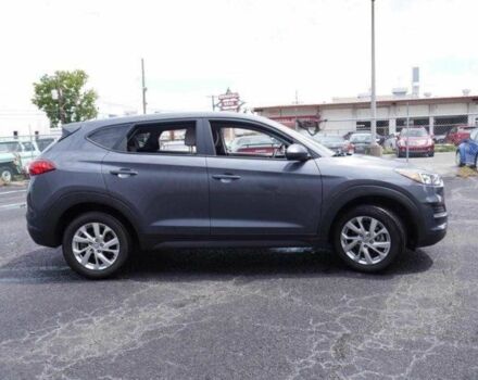 Серый Хендай Туксон, объемом двигателя 2 л и пробегом 149 тыс. км за 15000 $, фото 3 на Automoto.ua