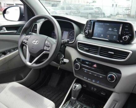 Серый Хендай Туксон, объемом двигателя 2 л и пробегом 149 тыс. км за 15000 $, фото 13 на Automoto.ua