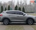 Серый Хендай Туксон, объемом двигателя 2 л и пробегом 204 тыс. км за 17500 $, фото 5 на Automoto.ua