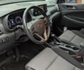 Сірий Хендай Туксон, об'ємом двигуна 2 л та пробігом 125 тис. км за 18000 $, фото 4 на Automoto.ua