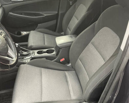 Серый Хендай Туксон, объемом двигателя 2 л и пробегом 140 тыс. км за 19700 $, фото 17 на Automoto.ua