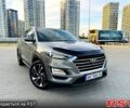 Серый Хендай Туксон, объемом двигателя 2 л и пробегом 129 тыс. км за 23999 $, фото 1 на Automoto.ua