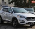 Сірий Хендай Туксон, об'ємом двигуна 2.36 л та пробігом 118 тис. км за 19000 $, фото 2 на Automoto.ua