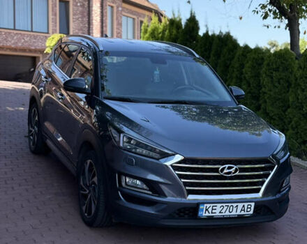 Серый Хендай Туксон, объемом двигателя 2 л и пробегом 157 тыс. км за 22500 $, фото 2 на Automoto.ua