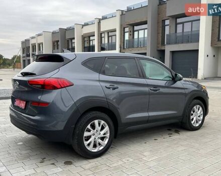 Сірий Хендай Туксон, об'ємом двигуна 2 л та пробігом 124 тис. км за 16480 $, фото 4 на Automoto.ua