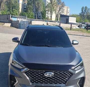 Серый Хендай Туксон, объемом двигателя 2.4 л и пробегом 60 тыс. км за 23500 $, фото 2 на Automoto.ua