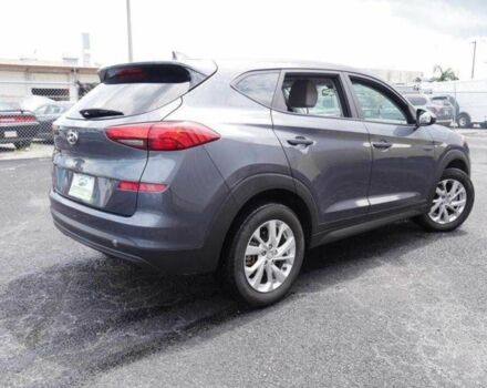 Серый Хендай Туксон, объемом двигателя 2 л и пробегом 149 тыс. км за 15000 $, фото 4 на Automoto.ua