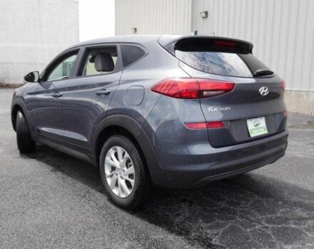 Серый Хендай Туксон, объемом двигателя 2 л и пробегом 149 тыс. км за 15000 $, фото 6 на Automoto.ua