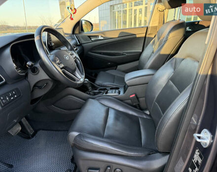 Серый Хендай Туксон, объемом двигателя 1.6 л и пробегом 214 тыс. км за 21000 $, фото 55 на Automoto.ua