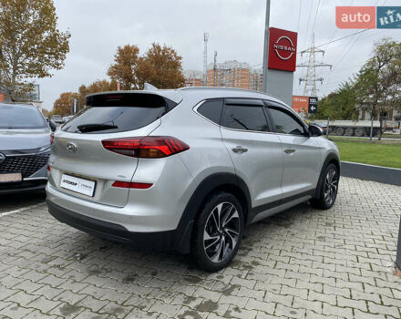 Серый Хендай Туксон, объемом двигателя 2 л и пробегом 73 тыс. км за 22400 $, фото 11 на Automoto.ua