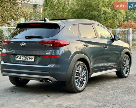 Серый Хендай Туксон, объемом двигателя 2.36 л и пробегом 85 тыс. км за 22500 $, фото 4 на Automoto.ua