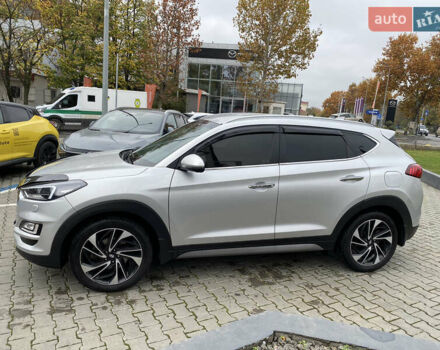 Серый Хендай Туксон, объемом двигателя 2 л и пробегом 73 тыс. км за 22400 $, фото 5 на Automoto.ua