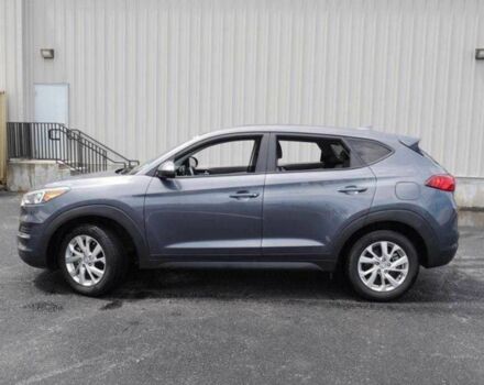 Серый Хендай Туксон, объемом двигателя 2 л и пробегом 149 тыс. км за 15000 $, фото 7 на Automoto.ua