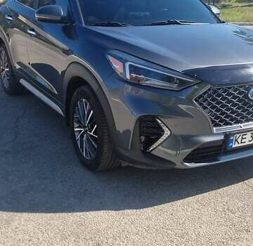 Серый Хендай Туксон, объемом двигателя 2.4 л и пробегом 60 тыс. км за 23500 $, фото 1 на Automoto.ua