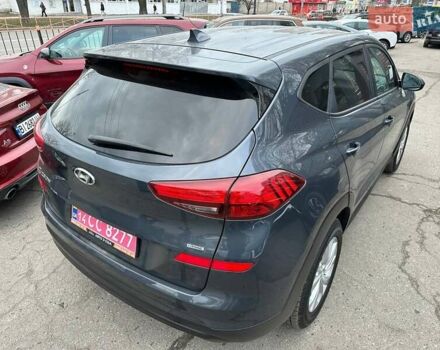 Сірий Хендай Туксон, об'ємом двигуна 2 л та пробігом 120 тис. км за 15999 $, фото 4 на Automoto.ua