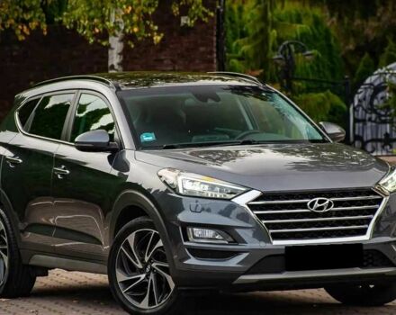 Серый Хендай Туксон, объемом двигателя 1.6 л и пробегом 100 тыс. км за 9900 $, фото 4 на Automoto.ua