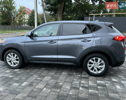 Серый Хендай Туксон, объемом двигателя 2 л и пробегом 204 тыс. км за 17600 $, фото 4 на Automoto.ua