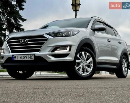 Серый Хендай Туксон, объемом двигателя 2 л и пробегом 32 тыс. км за 22800 $, фото 3 на Automoto.ua