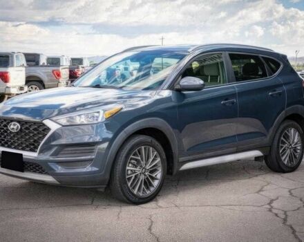 Серый Хендай Туксон, объемом двигателя 2.4 л и пробегом 33 тыс. км за 14000 $, фото 2 на Automoto.ua