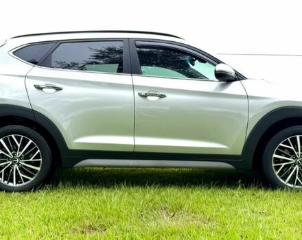 Серый Хендай Туксон, объемом двигателя 2.4 л и пробегом 39 тыс. км за 9500 $, фото 7 на Automoto.ua