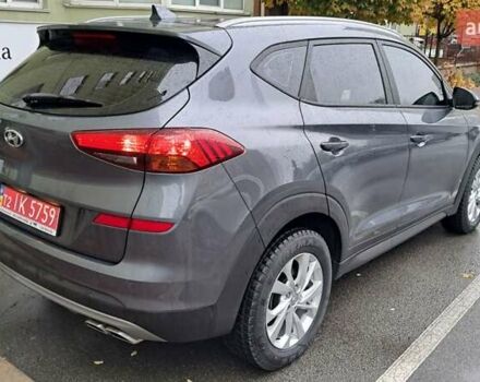 Серый Хендай Туксон, объемом двигателя 2 л и пробегом 103 тыс. км за 24900 $, фото 5 на Automoto.ua