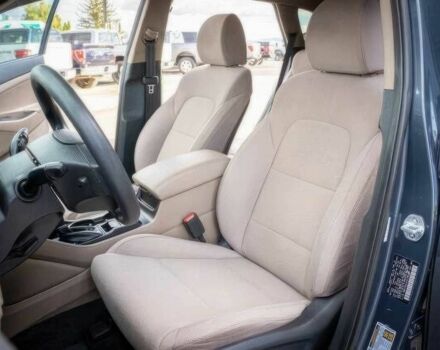 Серый Хендай Туксон, объемом двигателя 2.4 л и пробегом 33 тыс. км за 14000 $, фото 7 на Automoto.ua