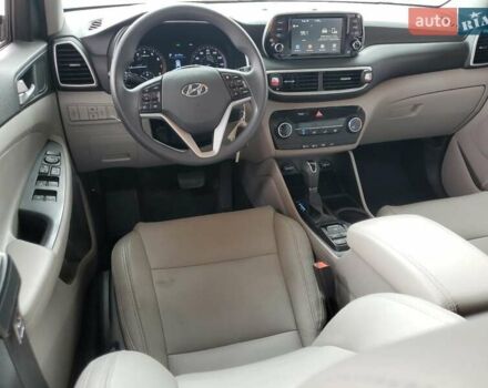 Серый Хендай Туксон, объемом двигателя 2 л и пробегом 104 тыс. км за 5600 $, фото 7 на Automoto.ua