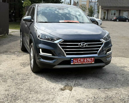 Серый Хендай Туксон, объемом двигателя 1.6 л и пробегом 124 тыс. км за 23499 $, фото 4 на Automoto.ua