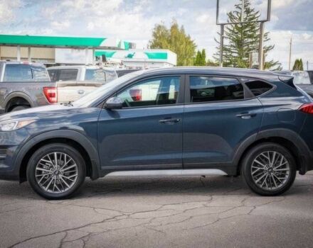 Серый Хендай Туксон, объемом двигателя 2.4 л и пробегом 33 тыс. км за 14000 $, фото 4 на Automoto.ua