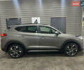 Серый Хендай Туксон, объемом двигателя 2 л и пробегом 28 тыс. км за 30200 $, фото 3 на Automoto.ua