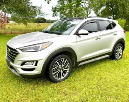 Серый Хендай Туксон, объемом двигателя 2.4 л и пробегом 39 тыс. км за 9500 $, фото 2 на Automoto.ua