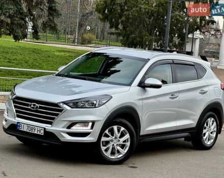 Серый Хендай Туксон, объемом двигателя 2 л и пробегом 32 тыс. км за 22800 $, фото 4 на Automoto.ua
