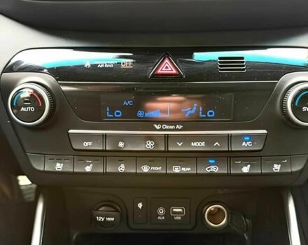 Серый Хендай Туксон, объемом двигателя 2.4 л и пробегом 39 тыс. км за 9500 $, фото 10 на Automoto.ua