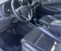 Серый Хендай Туксон, объемом двигателя 2 л и пробегом 85 тыс. км за 25000 $, фото 4 на Automoto.ua
