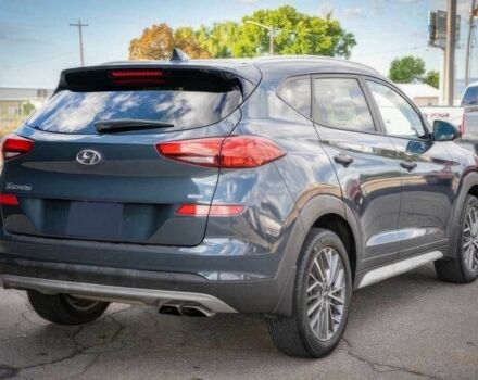 Серый Хендай Туксон, объемом двигателя 2.4 л и пробегом 33 тыс. км за 14000 $, фото 5 на Automoto.ua