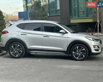 Сірий Хендай Туксон, об'ємом двигуна 2 л та пробігом 176 тис. км за 22999 $, фото 4 на Automoto.ua